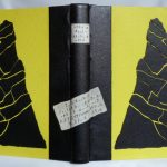 reliure-art-maurice-leblanc-aiguille-creuse-demi-cuir-noir-jaune-parchemin-biennale-mondiale-12ième-