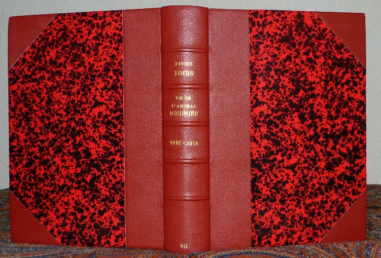 7 tomes reliés identiquement, demi-cuir à coins, rouge, papier Annonay rouge. Poisson d'avril.