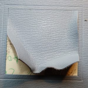 Incrustation d'un parchemin décoré à la photocopieuse, retirage du carré de cuir
